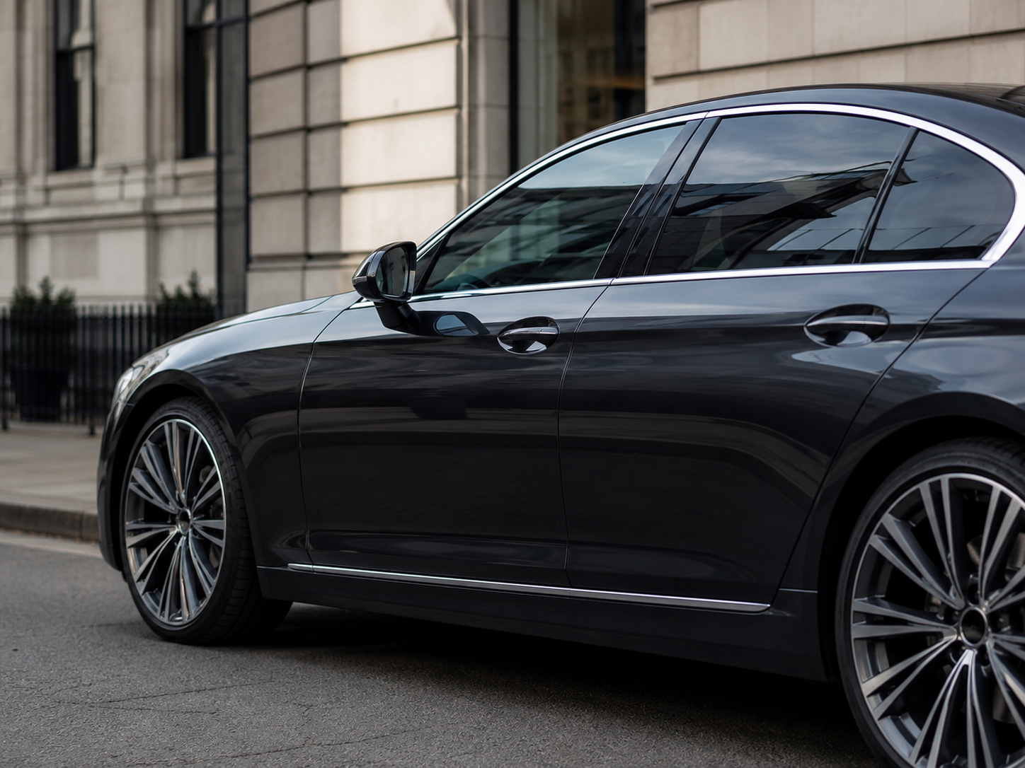 Ravi’s premium dark executive vehicle